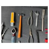 Collection of Various Hand Tools Including Pliers and Hammers
