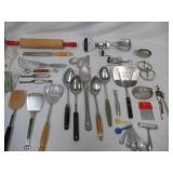 Lot of Vintage Baking, Serving & Cutting Utensils, Strainers, Rolling Pin, Beaters, and more.
