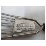 Lot of Vintage Baking, Serving & Cutting Utensils, Strainers, Rolling Pin, Beaters, and more.