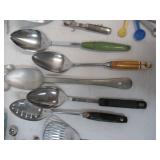 Lot of Vintage Baking, Serving & Cutting Utensils, Strainers, Rolling Pin, Beaters, and more.