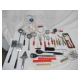 Lot of Vintage Utensils. Some with wood handles.