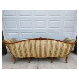 Vintage Sofa with wood trim. 89" long.