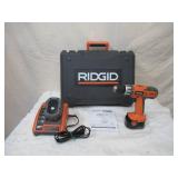 Rigid Drill with Instructions, 2 Batteries and Charger in case.