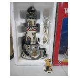 Lot of 4 Lighthouses in original boxes.