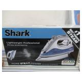 Lot of Ironing Items. New Iron in box, Ironing Board, New Pad and more