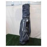 Dunlop Golf Clubs in Golf Bag with Golf Balls, Golf Club covers, Rain Cover and more. AS PICTURED.