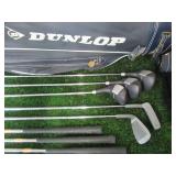 Dunlop Golf Clubs in Golf Bag with Golf Balls, Golf Club covers, Rain Cover and more. AS PICTURED.