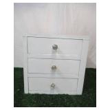 Vintage painted wood set of table top dovetailed drawers with glass knobs.