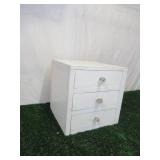 Vintage painted wood set of table top dovetailed drawers with glass knobs.