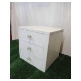 Vintage painted wood set of table top dovetailed drawers with glass knobs.