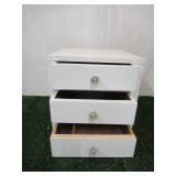 Vintage painted wood set of table top dovetailed drawers with glass knobs.