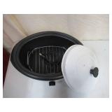 Lot of 3 Cookers: Rival Electric Skillet, Rival 8 Qt. Electric Roaster Oven, Nesco 6 Qt. Electric Roaster Oven.