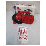 Dirt Devil Handheld Vacuum Cleaner with accessories in box and instructions.