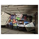 Lots of books, DVDs, and magazines. Box not included in this sale