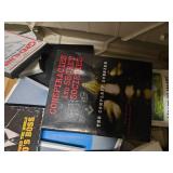 Lots of books, DVDs, and magazines. Box not included in this sale