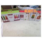 A lot containing Zoku Case and 4 boxes of Zoku Sticks