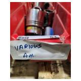 Collection of Various Socket Tools in a Red Storage Bin