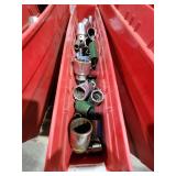 Collection of Various Socket Tools in a Red Storage Bin