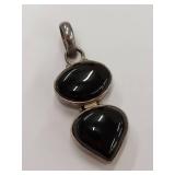 Elegant Sterling Silver Pendant with Black Stones