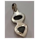 Elegant Sterling Silver Pendant with Black Stones