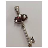 Sterling Silver Key Pendant with Red Gemstones