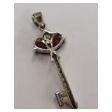 Sterling Silver Key Pendant with Red Gemstones