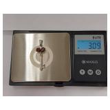 Sterling Silver Key Pendant with Red Gemstones