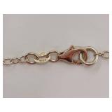 Elegant Sterling Silver Chain with Gold-Plated Oval Pendant