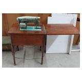 White Zigzag Stitcher Sewing Machine in Wood Cabinet
