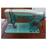 White Zigzag Stitcher Sewing Machine in Wood Cabinet