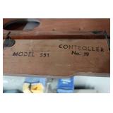 White Zigzag Stitcher Sewing Machine in Wood Cabinet