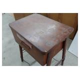 White Zigzag Stitcher Sewing Machine in Wood Cabinet