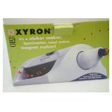 Xyron model 510: sticker maker, laminator, label maker, magnet maker.