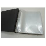 2" binder full of clear page protectors