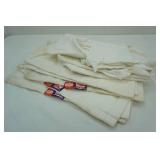 about 1 dozen dishcloths