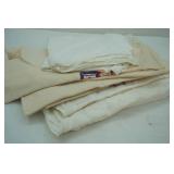 about 1 dozen dishcloths