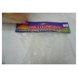 Several Hula Skirts & Coconut top