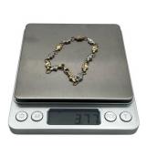 7-inch 14K Gold Heart Shapes Tennis Bracelet (Stamped AU 14K) (3.7 grams)