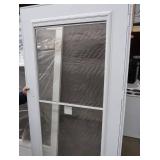 TWO NEW SCREEN DOORS, ONE OUT OF BOX
