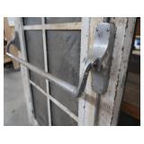 A SET OF TWO HEAVY DUTY STEEL AND GLASS METAL SAFETY DOORS