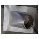 BLACK CAST IRON STOVE ON STAND WITH ROOF VENT