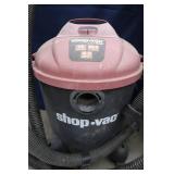 TWO SHOP VACS WHIT HOSES AND EXTENSIONS