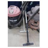 TWO SHOP VACS WHIT HOSES AND EXTENSIONS