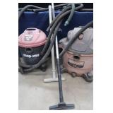 TWO SHOP VACS WHIT HOSES AND EXTENSIONS