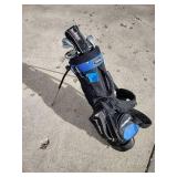 Assorted youth golf clubs and bag