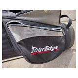 Assorted youth golf clubs and bag