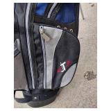 Assorted youth golf clubs and bag