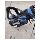 Assorted youth golf clubs and bag