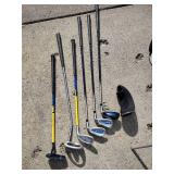 Assorted youth golf clubs and bag