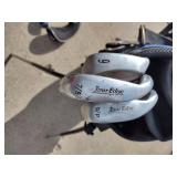 Assorted youth golf clubs and bag